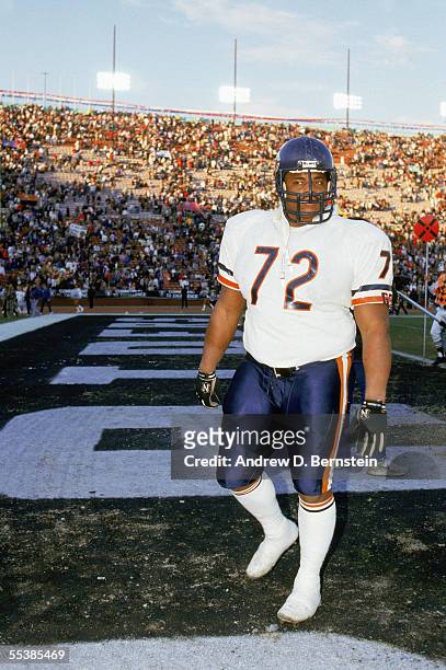 William Perry of the Chicago Bears walks through the end zone after a game against the Los Angeles Raiders on December 27, 1987 at the Los Angeles...