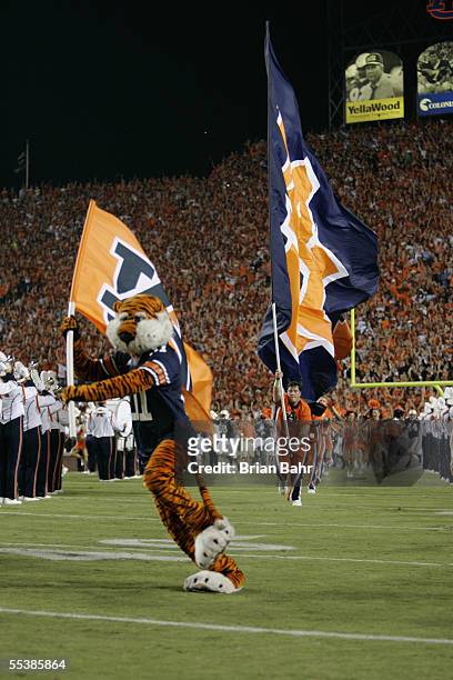 The Auburn Tigers mascot leads the cheerleaders and team out onto the field prior to the start of the game against the Georgia Tech Yellow Jackets on...