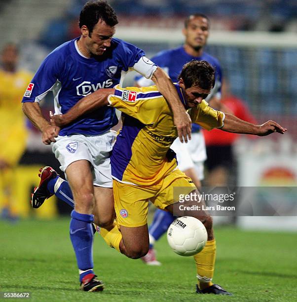 Thomas Zdebel of Bochum in action with Marcel Schied of Rostock during the 2nd Bundesliga match between VfL Bochum and Hansa Rostock at the...