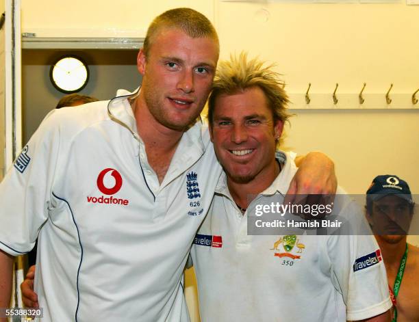 Andrew Flintoff of England and Shane Warne of Australia pose in the Australian dressing room after play as England regain the Ashes during day five...