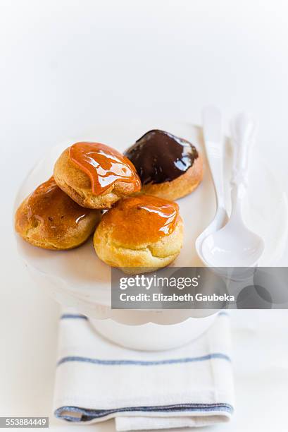 homemade profiteroles - profiterole stock pictures, royalty-free photos & images