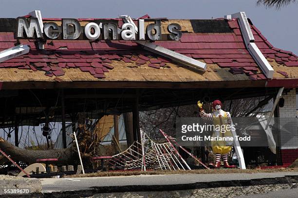 The sculpture of Ronald McDonald still stands at the front of destroyed McDonald's restaurant September 12, 2005 in Biloxi, Mississippi. Residents,...