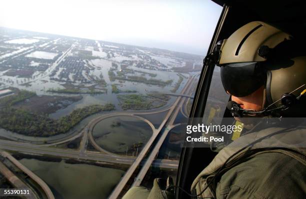 Army Sgt. Ed Wrubluski looks at the fully evacuated New Orleans area September 12, 2005 in New Orleans, Louisiana. U.S. President George W. Bush, on...