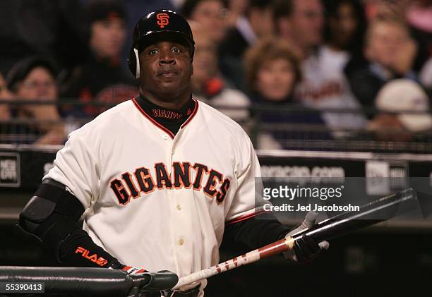Barry Bonds of the San Francisco Giants walks to the plate against the San Diego Padres at SBC Park September 12, 2005 in San Francisco, California....