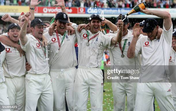 The England team celebrate after regaining the Ashes during day five of the Fifth npower Ashes Test match between England and Australia at the Brit...