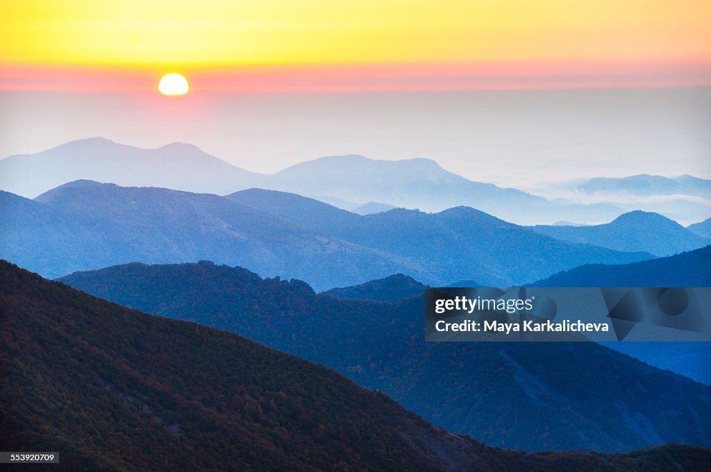 Sunrise over mountain ranges, Rhodope, Bulgaria