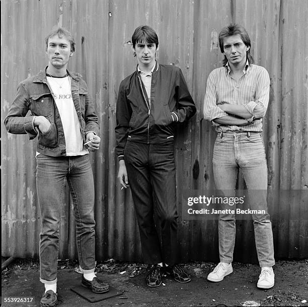 The Jam outside The Townhouse recording studio in Shepherds Bush, London, 1979. Left to right: drummer Rick Buckler, singer and guitarist Paul Weller...