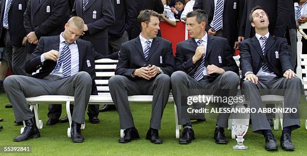 London, UNITED KINGDOM: England cricketers Andrew Flintoff Marcus Trescothick Ashley Giles and captain Michael Vaughn sit at Lords cricket ground in...