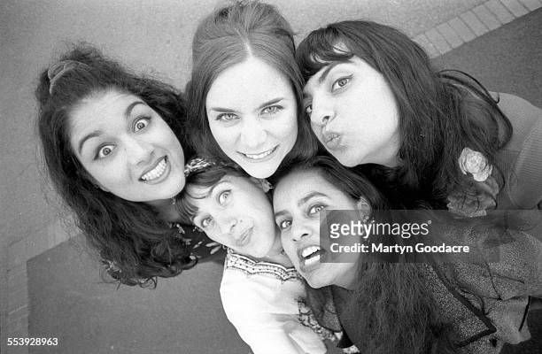 Group portrait of riot grrrl group Voodoo Queens, London, 1992. Line up includes Anjali Bhatia and Ella Guru.