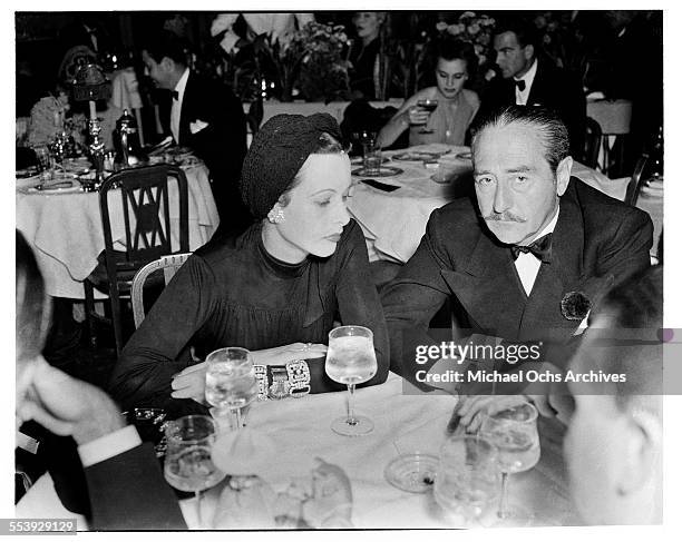 Actor Adolphe Menjou and actress Hedy Lamarr attend an event in Los Angeles, California.