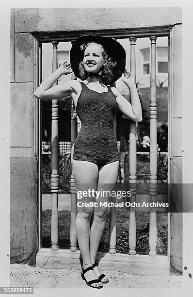 Actress Betty Grable poses in a swim suit and hat in Los Angeles, California.