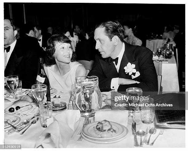 Actor Fredric March and actress Luise Rainer attend the 10th Academy Awards in Los Angeles, California.