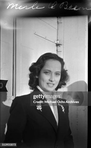 Actress Merle Oberon is photographed on a street in Los Angeles, California