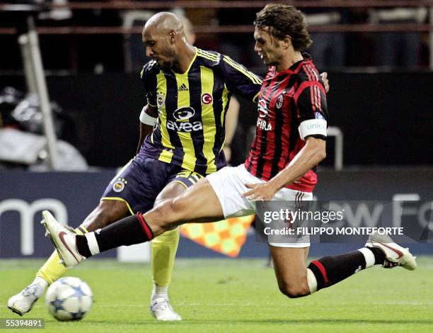 Milan's Paolo Maldini tackles French Nicolas Anelka of Fenerbahce SK during their Champion's league football match at S. Siro Stadium in Milan 13...