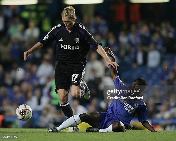 Christian Wilhelmsson of Anderlecht holds off Shaun Wright-Phillips of Chelsea during the UEFA Champions League match between Chelsea and RSC...