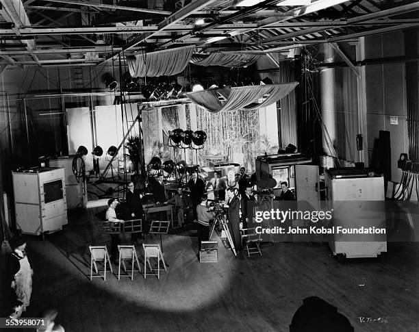 The set of a Vitaphone short film at the Vitagraph studio in Brooklyn, New York City, 1925. The cameras have been removed from their booths for the...