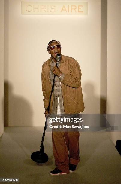 Rapper Mos Def performs on the runway at the Chris The Iceman Aire  News Photo - Getty Images