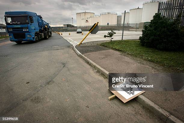Discarded placard is seen outside a fuel deppo, September 14, 2005 in Purfleet, England. Three days of organised fuel protests has prompted a surge...