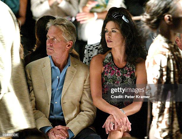 Actor Michael Douglas and his wife actress Catherine Zeta Jones attend the Michael Kors Spring 2006 fashion show during Olympus Fashion Week at the...