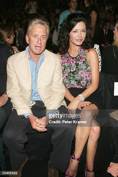 Actor Michael Douglas and his wife actress Catherine Zeta Jones attend the Michael Kors Spring 2006 fashion show during Olympus Fashion Week at the...