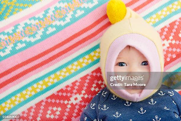 Baby On Rug 29 Pom Pom Rug Stock Photos, High-Res Pictures, and Images - Getty Images
