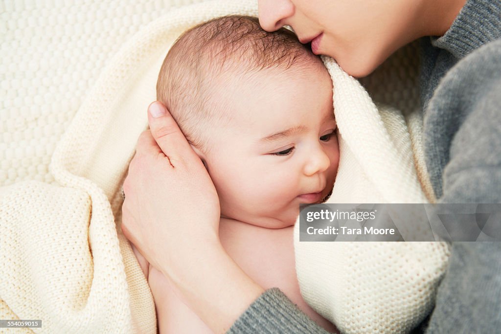 Mother and baby lying together