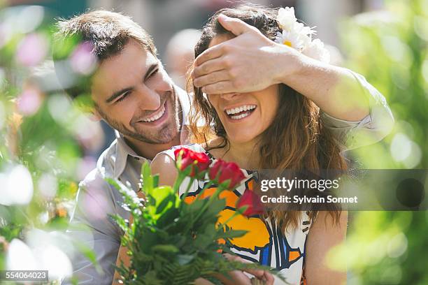 young couple dating in paris - man in dress foto e immagini stock