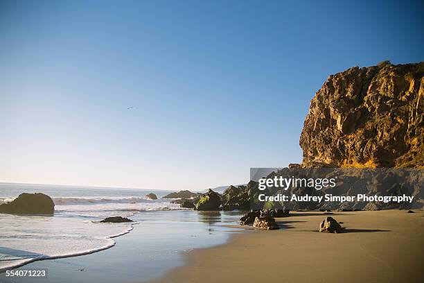 zuma beach at sunset - zuma stock pictures, royalty-free photos & images