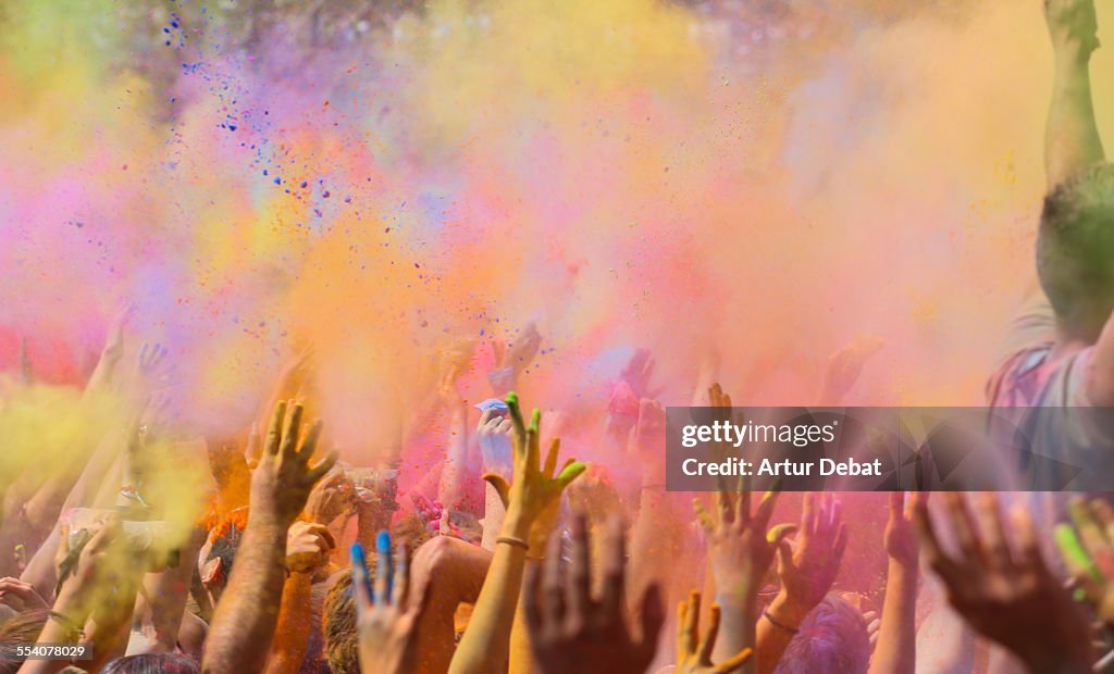 People celebrating the holi festival in Barcelona.