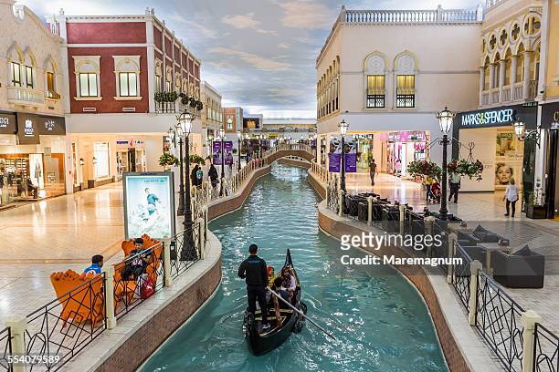 aspire zone, villaggio mall, gondolania theme park - qatar business stock pictures, royalty-free photos & images