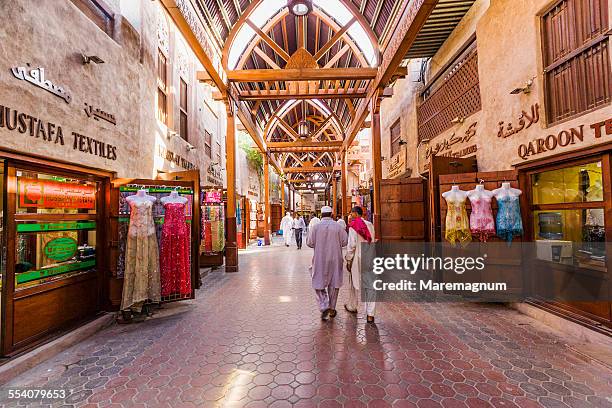 bur dubai, the textile souk - souq stock pictures, royalty-free photos & images