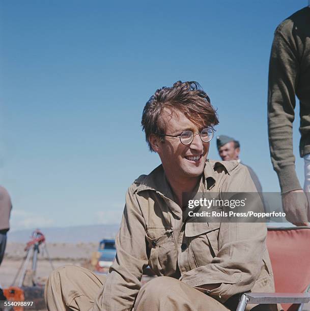 Guitarist with The Beatles, John Lennon pictured dressed in character as Muskateer Gripweed on location in Almeria, Spain during production of the...