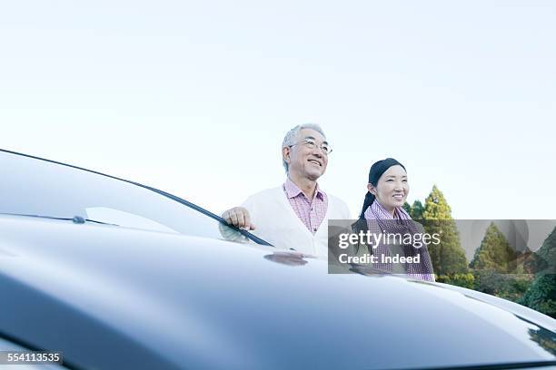 two people making a pose - asian man long hair stock pictures, royalty-free photos & images