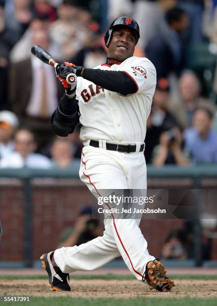 Barry Bonds of the San Francisco Giants swings and misses, pinch hitting in the eighth inning against the San Diego Padres at SBC Park on September...