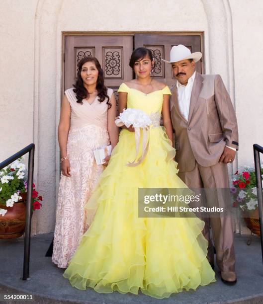 hispanic family celebrating quinceanera outside catholic church - glamourous granny 個照片及圖片檔