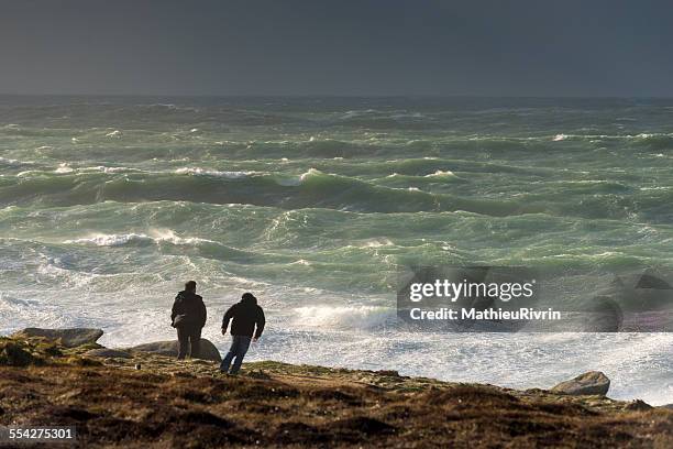 man vs wild in the storm - squall stock pictures, royalty-free photos & images