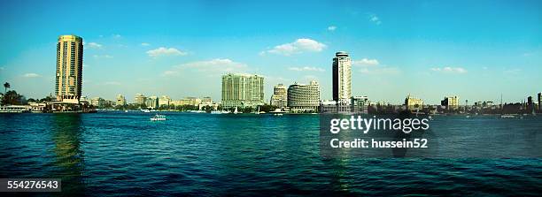on the banks of the cairo nile - hussein52 stock pictures, royalty-free photos & images
