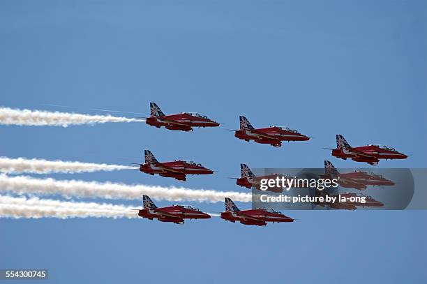 red arrows - red arrow stock pictures, royalty-free photos & images