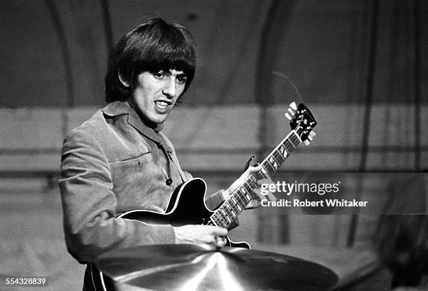 George Harrison is pictured at the Donmar Rehearsal Theatre central London during rehearsals for The Beatles upcoming UK tour. November 1965.