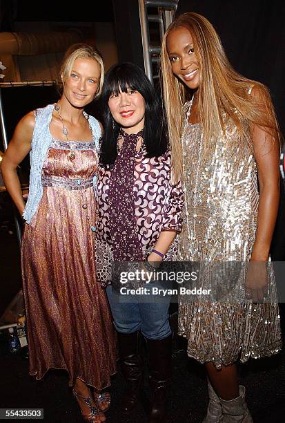 Carolyn Murphy, Anna Sui and Naomi Campbell pose backstage at the Anna Sui Spring 2006 fashion show during Olympus Fashion Week at Bryant Park on...