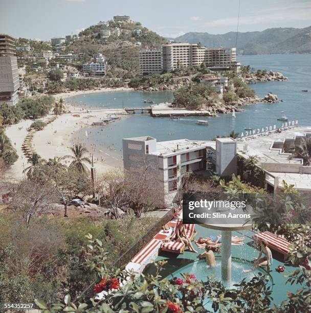High angle view of Caleta Beach in Acapulco, Mexico, January 1961. The Hotel Boca Chica can be seen to the right.