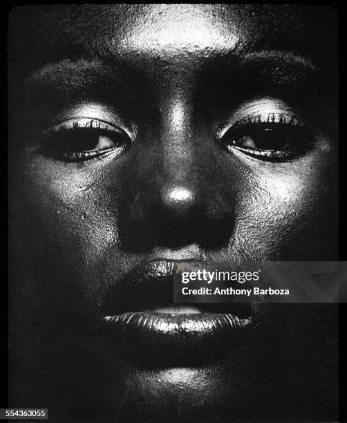 Close-up portrait of actress, musician, and model Grace Jones, New York, 1970s.