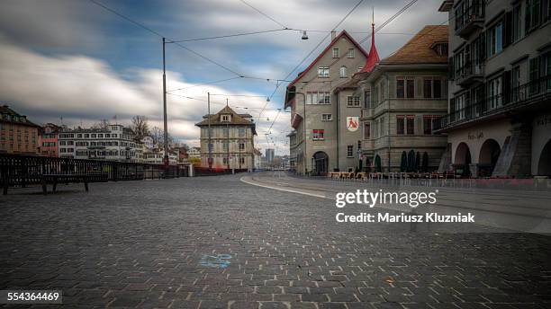 zurich limmatquai empty street old town - zürich stock-fotos und bilder