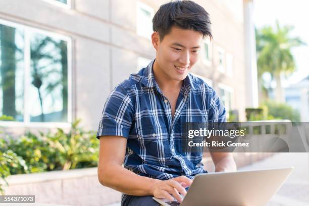 Korean Man Using Computer Korean Man Laptop Photos and Premium High Res Pictures - Getty Images