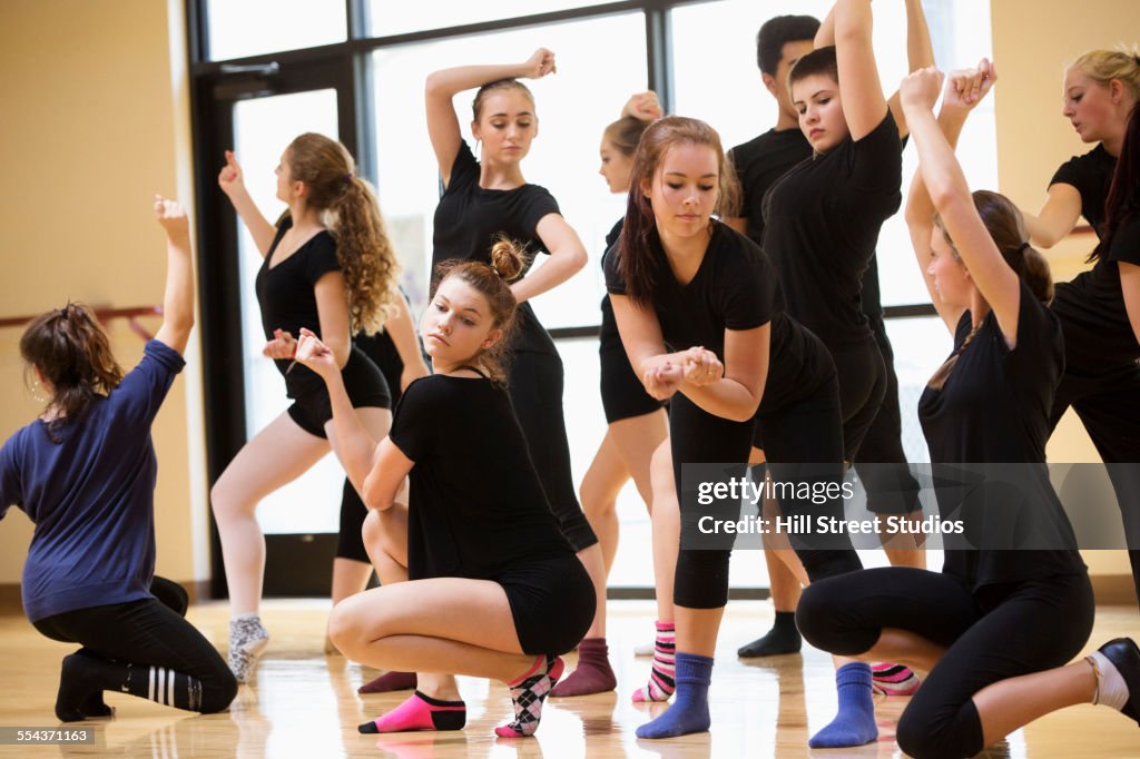 Teenage dancers rehearsing in studio