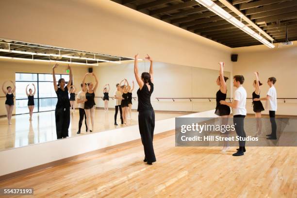 ballet dancers rehearsing in studio - street ballet stock pictures, royalty-free photos & images
