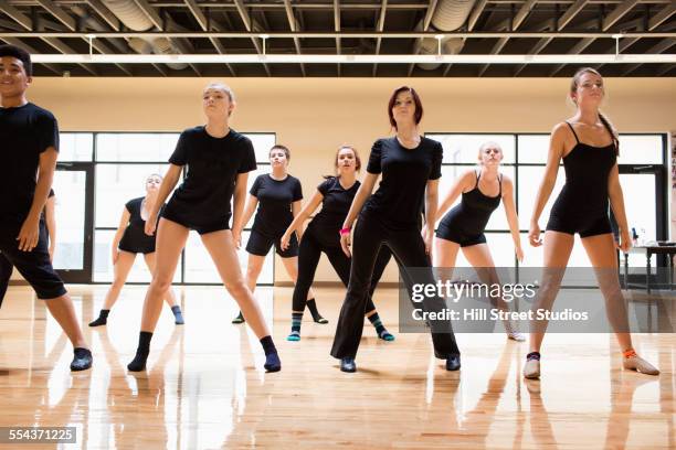 teenage dancers rehearsing in studio - rehearsing lines stock pictures, royalty-free photos & images