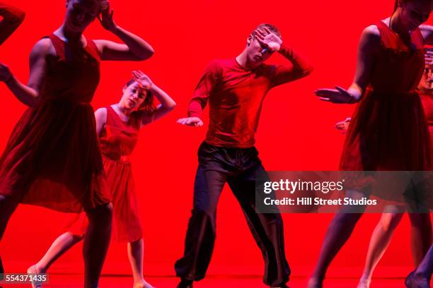 dancers performing on stage - modern dance bildbanksfoton och bilder