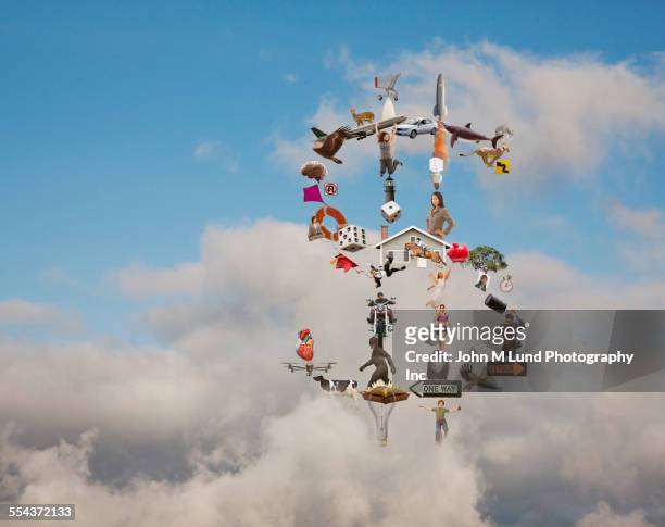 variety of objects forming dollar sign in clouds - different animals together stock-fotos und bilder