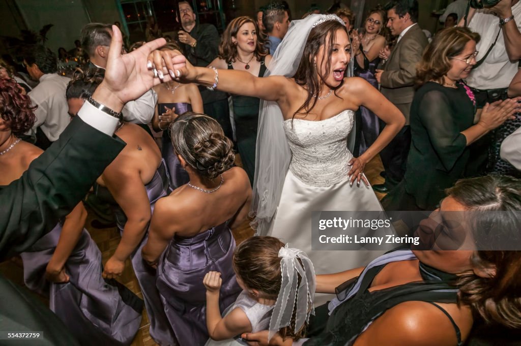 High angle view of bride and groom dancing at wedding reception